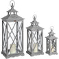 Set Of Three Wooden Lanterns With Traditional Cross Section by Hill Interiors